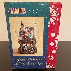 Traditions musical water globe with revolving base